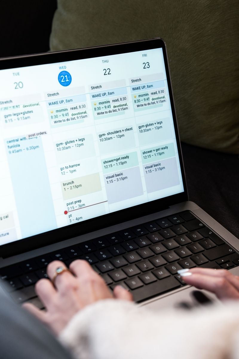 A family reviewing a grocery list together at a kitchen table.